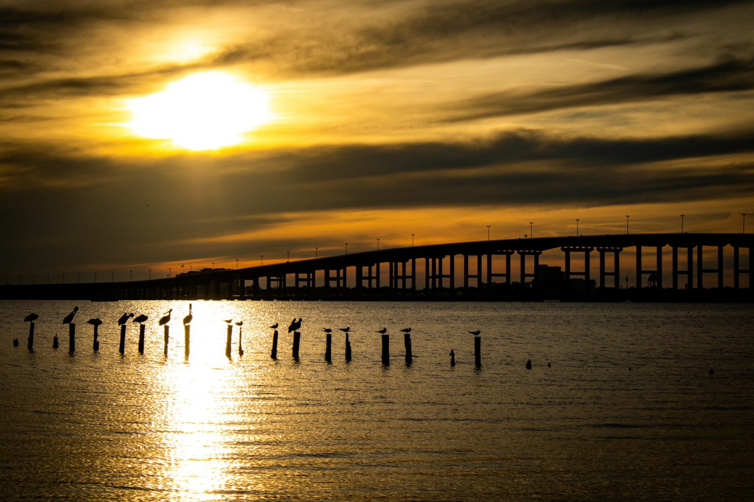 Ocean Springs bridge at sunset over the Florida Sound